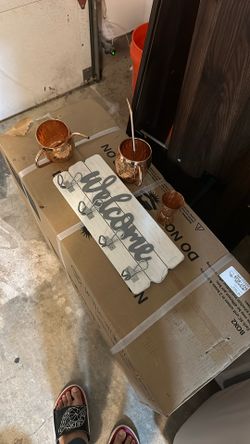 Welcome Sign And Copper Cups