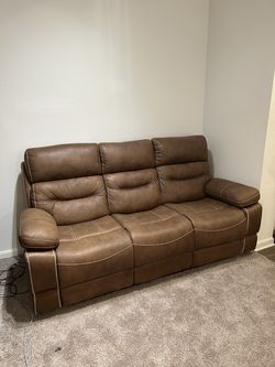 Brown Faux leather fully reclining couch - Perfect Condition
