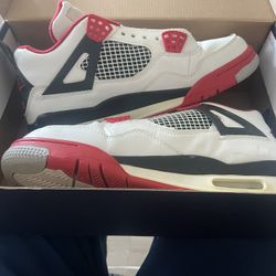 Nike Air Jordan 4 Retro "Fire Red" sneakers in a white, black, and red colorway