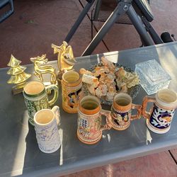 Beer Mugs And Angel Figures 