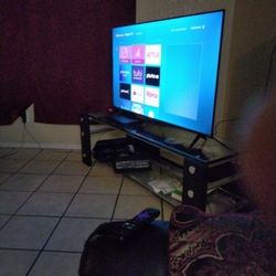 52 Inch Hisense ROKU  TV  And TV Stand 