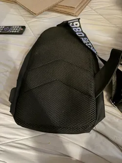 Black Crossbody Sling Bag — Interior Pocket Tear