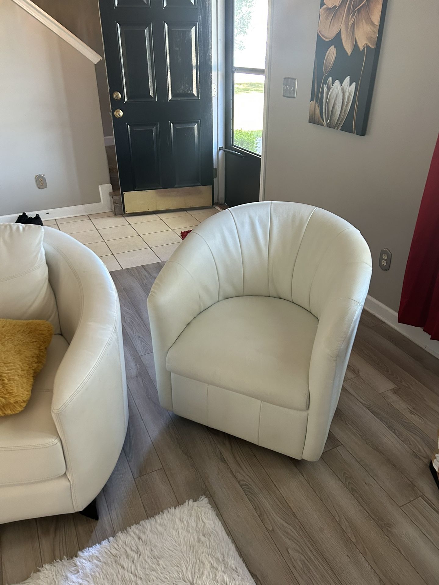 white leather couch in chair 