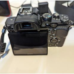 Sony Alpha A7 24.3 MP Mirrorless Digital Camera Black W/35mm Rokinon F1.8 Lens