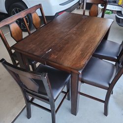 Table 4 Chairs and a bench $100.00
