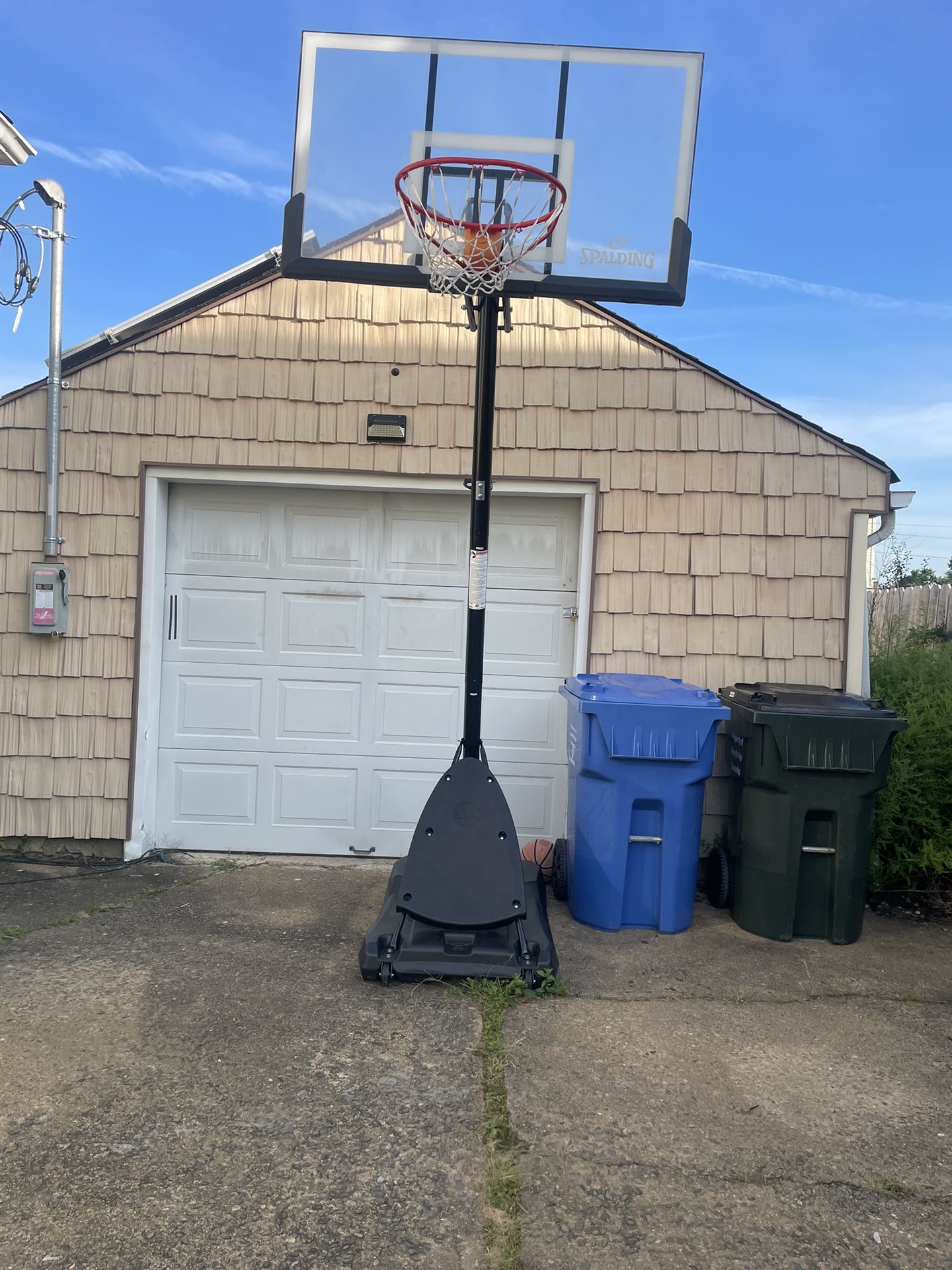 Spalding 54 In. Shatter-proof Polycarbonate Exacta height-Portable Basketball Hoop System