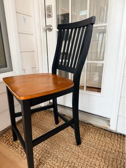 2 counter height wooden stools