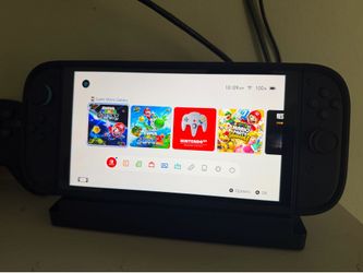 Nintendo Switch 2 with Pro Controllers and Game
