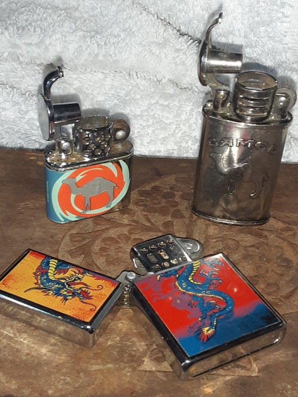 TWO VINTAGE JOE CAMEL CIGARETTE LIGHTERS
