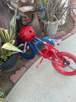 Kids bycecle for sale 35:00 dollars firm price with helmet ready to ride