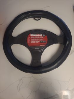 STEERING WHEEL GRIP