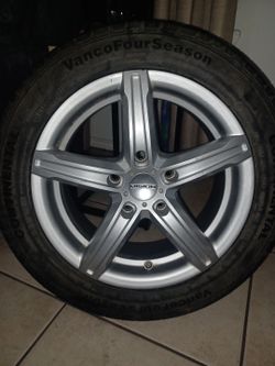 MUST SELL! Continental Four Seasons tire with Vision brand wheel