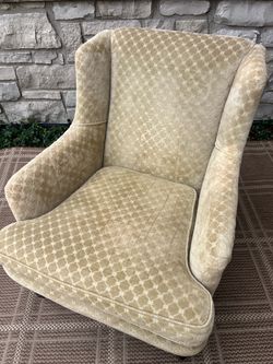 Upholstered armchair