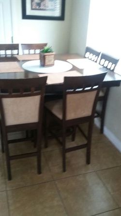 Used kitchen table with 7 chairs