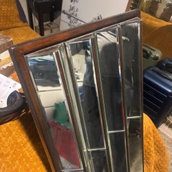 This is an Art Deco-style multi-panel beveled mirror.  Ready to hang..  52 “ high , 20” wide , 3 “ depth  $175