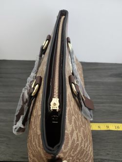 brown purse with a strap
