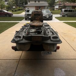 Pelican 10E bass rider boat with trailer