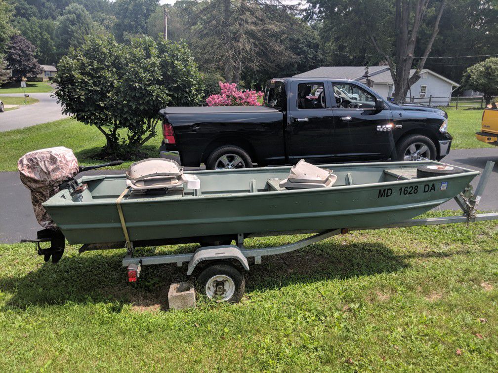 John boat with trailer and motor