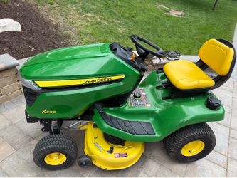 John Deere X300 42” Mulching Yard Tractor