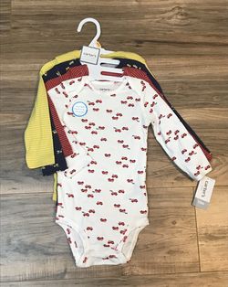 NEW 12m Carter’s 4 pack onesies - $10!!