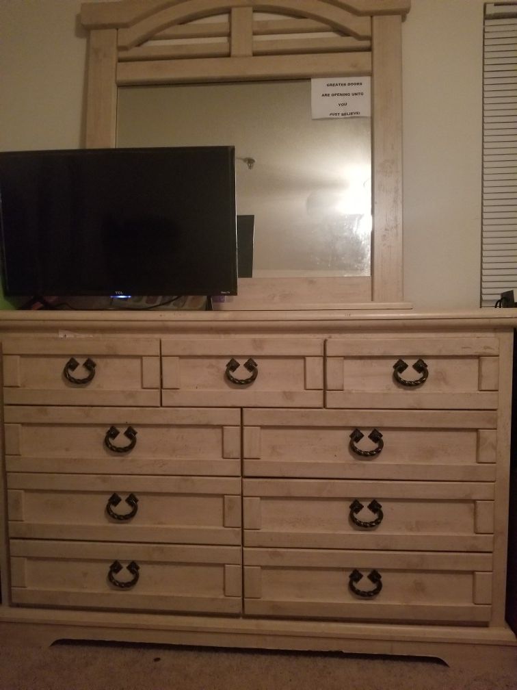 Dresser, mirror, and two side drawers.