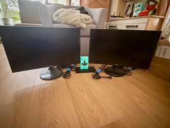 2x25in Samsung monitors with docking station, webcam, and cables