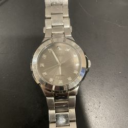 Its a Guess Watch Silver Color Needs A New Battery 