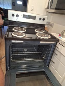 Estufa whirlpool de luz casi nueva