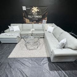 Sectional:m/couch/sofa, Size:110x140x68, Color:Teale, Material:leather, Delivery Available 