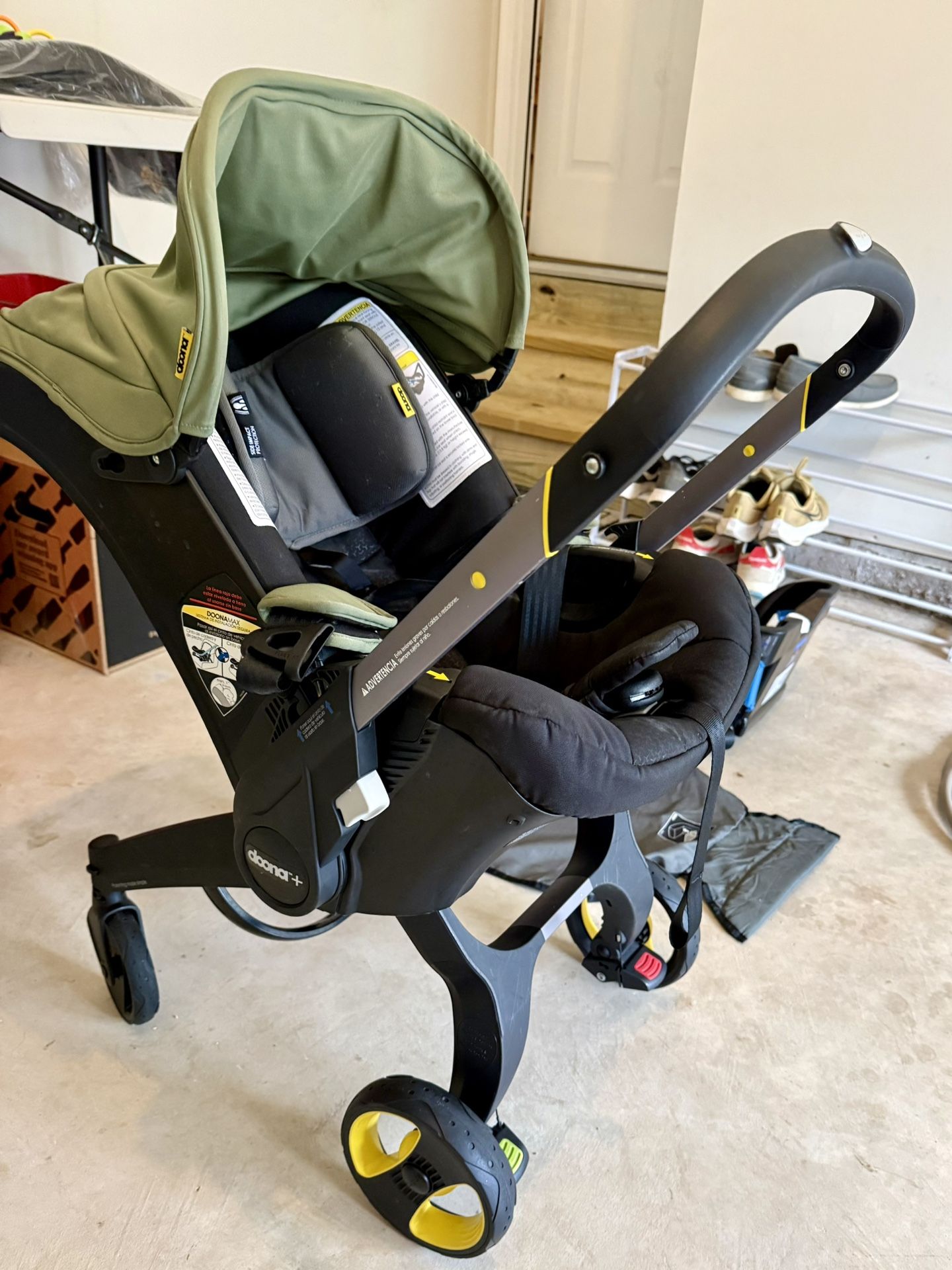 Doona Infant Car Seat + Base + Seat Cover – $300 (Excellent Condition)