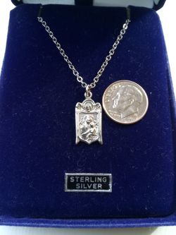 Our Mother of Perpetual Help Sterling Silver Medal on an 18 inch stainless steel chain. Religious jewelry.