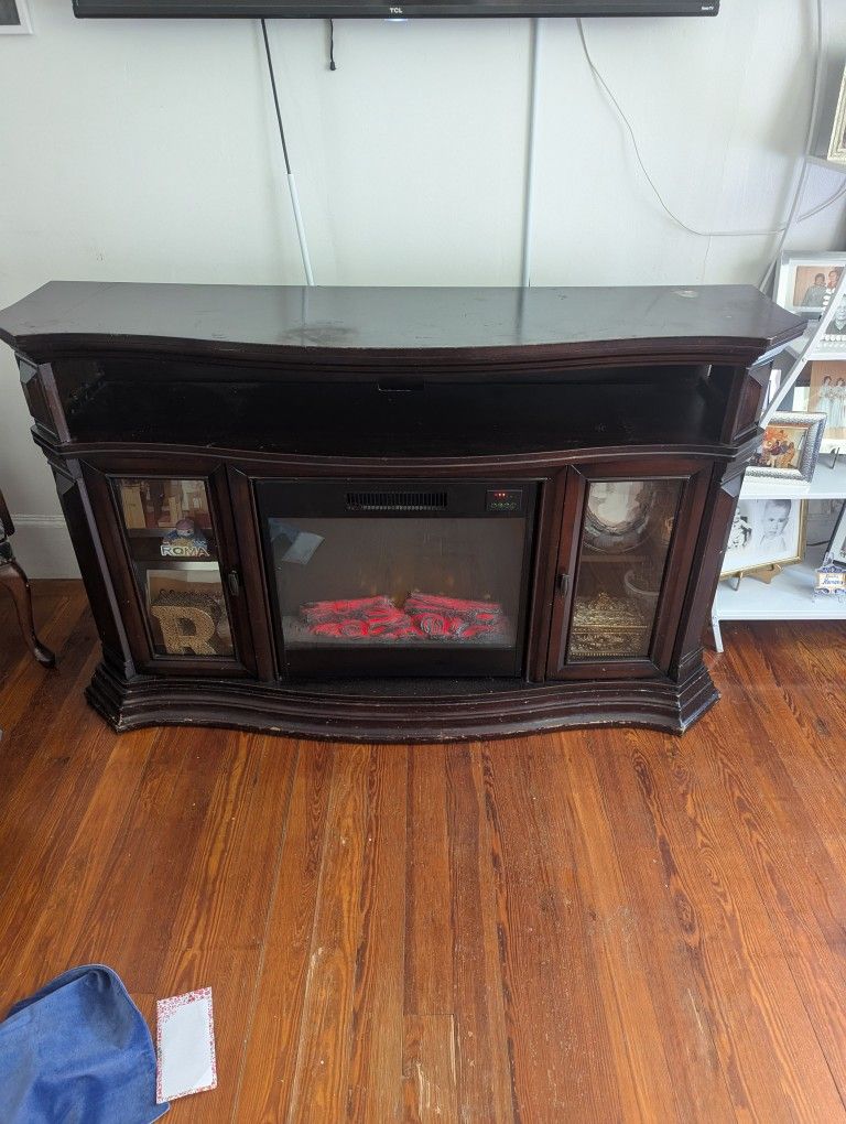 Electric Fireplace/ TV Stand location Is Revere