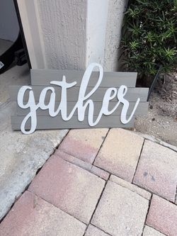 Gather sign (located in Palm Beach Gardens)