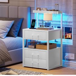 Nightstand with Charging Station and LED Lights, LED Night Stand with 2 USB Ports and 2 AC Outlets, Modern End Table with 3 Drawers, Bedside Table wit