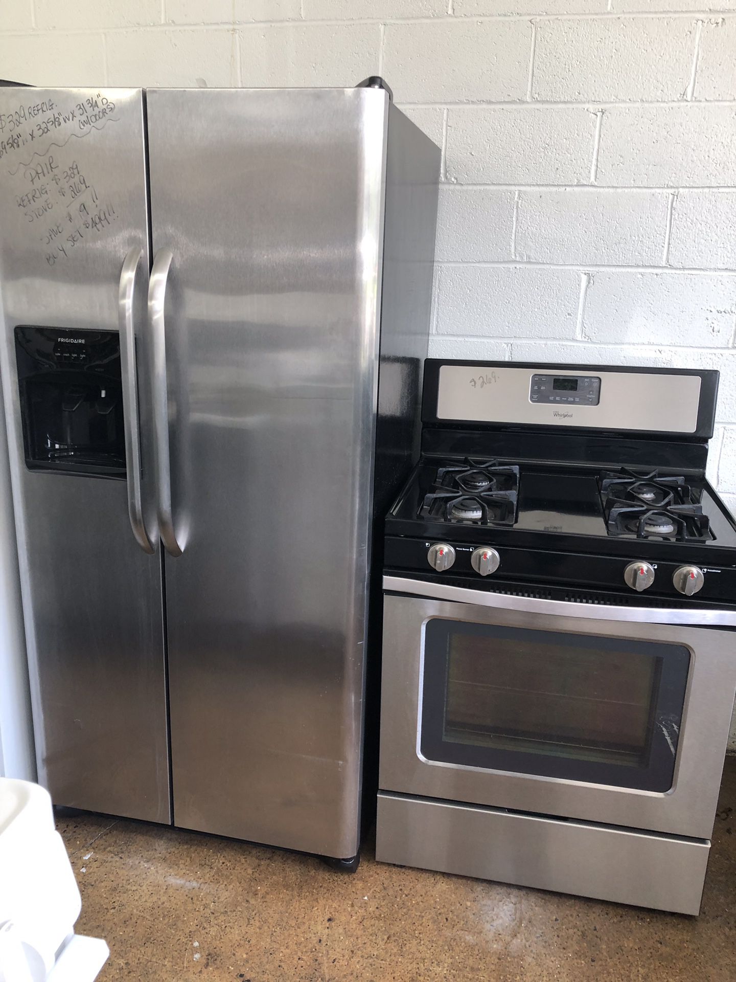 Stainless & Black Side by Side Frigidaire Refrigerator & Whirlpool Gas Range! 30-Day Warranty! We Can Deliver Today!