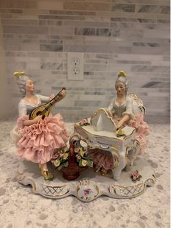 Antique Porcelain figurine