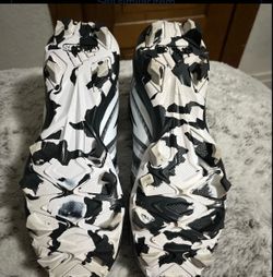 Black and white cleats