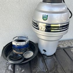 Titan T-1060 1 1/4 HP Disposal