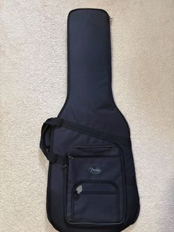 Electric guitar gig bags, three of them