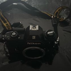 Nikon  EM 