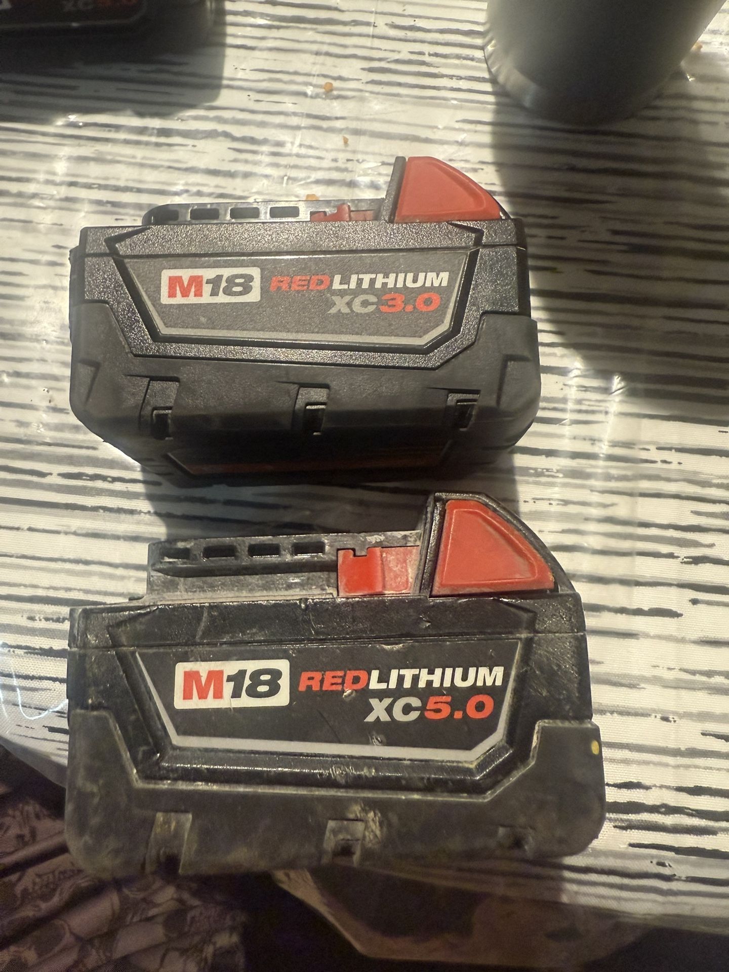 Milwaukee m18v 3ah and 5ah battery used both work and charge up fine $85 both in n Lakeland