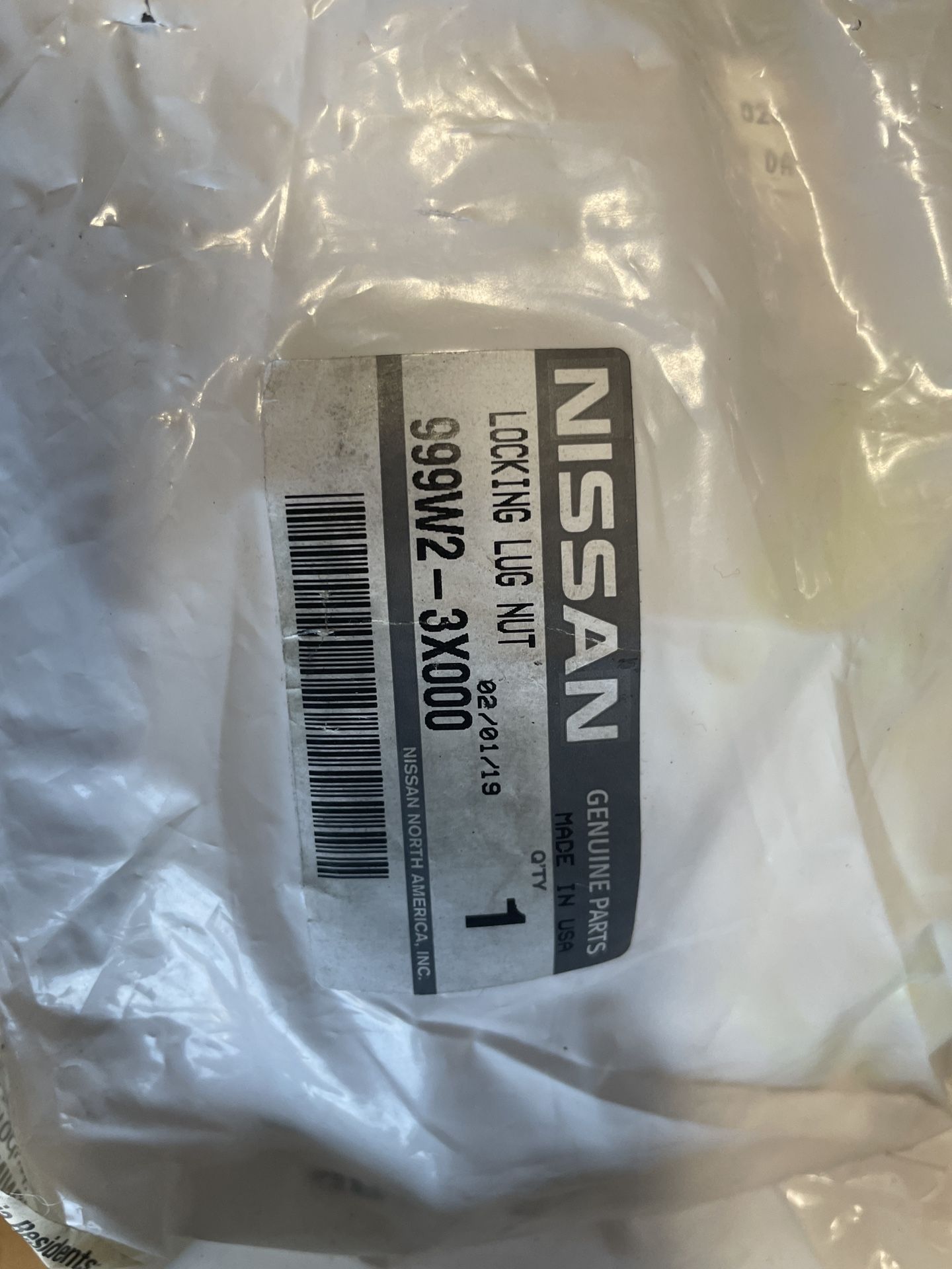 Genuine Nissan Wheel Locks (Part Number: 999W2-3X000)