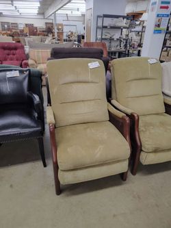 Dark tan wood cushioned recliner