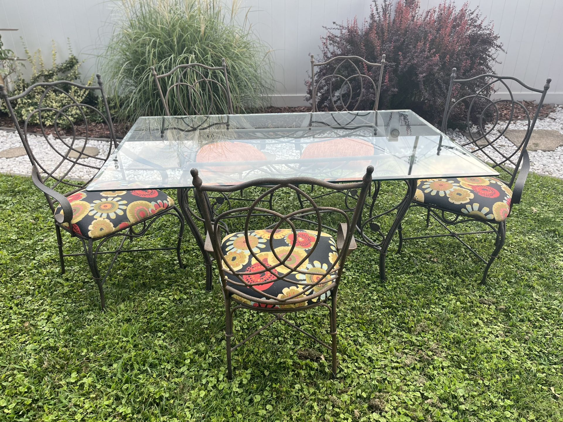 Wrought Iron Table With Glass Top And 5 Chairs