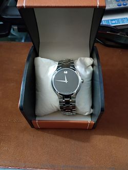 Use  original Movado watch  some scratches on the back side but works 100%