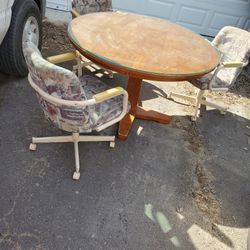 Round oak table and 3 chairs