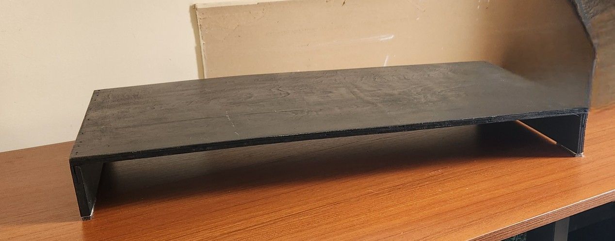 Sturdy Wooden TV Stand Shelf Hand Made and Painted in all Black with felt cushioning on all four corners. 
Measures 31" Long x 15" Deep x 3.5" Tall.