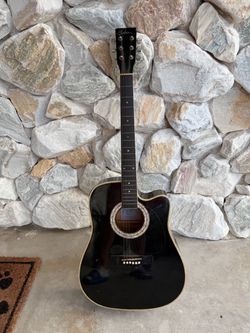 Esteban electric and acoustic guitar