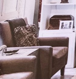 2 grey club chairs