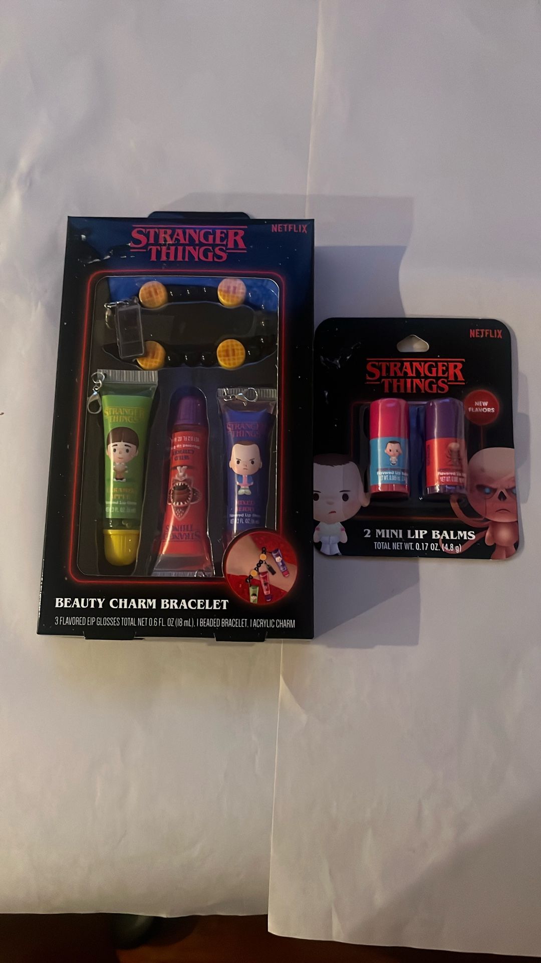 Stranger Things Lip Balms And Lip Gloss With Charm Bracelet
